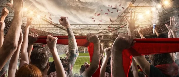 An image depicting a stadium filled with roaring fans, waving flags and banners, creating a visually stunning and intimidating atmosphere for the visiting team.