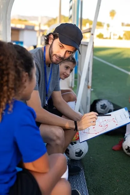 A La Liga team's coach intensely strategizing on the sidelines during a match, using a tactical board to illustrate plays to his players. The coach's animated gestures and the players' attentive expressions should highlight the importance of in-game adjustments.