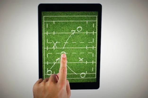 A close-up shot of a coach holding a tablet displaying a detailed heatmap of player movements during a match. The heatmap uses color gradients to indicate areas of high and low activity, providing insights into tactical positioning and player workloads. The coach is focused and intently studying the data.