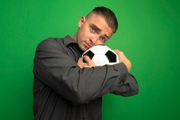 A close-up of a young, promising player in a La Liga team, showcasing their skill with the ball, with a determined expression on their face, symbolizing the league's focus on nurturing new talent.