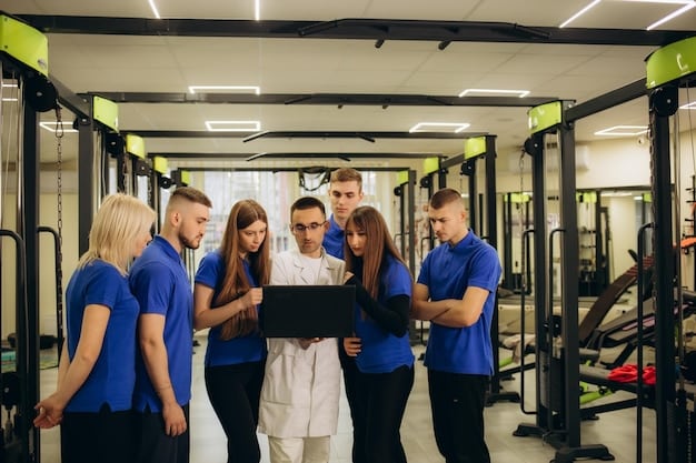 A wide shot of a Premier League team's medical staff conducting fitness tests on players during a training session. Various pieces of high-tech monitoring equipment are visible, and the focus is on the team's proactive approach to injury prevention.