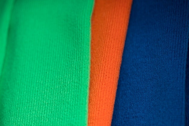 A close-up shot of a Premier League jersey made from recycled materials, showcasing the fabric's texture and highlighting the sustainable manufacturing process, with a focus on eco-friendly labels and insignias.